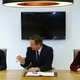 From left, French president Francois Hollande, British prime minister David Cameron, and German chancellor Angela Merkel meet on the sidelines of an emergency EU summit about Ukraine in Brussels on March 6.